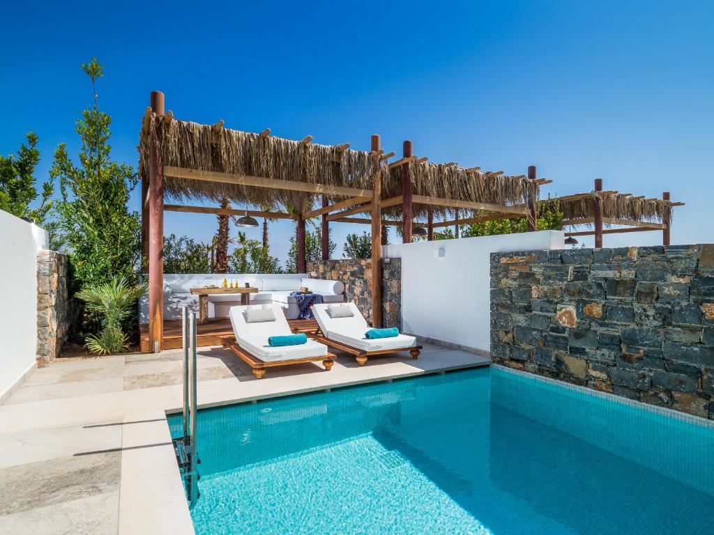 Discover A Heaven of Tranquility: Enjoy 5 Nights at Stella Island Luxury Resort & Spa with Half Board