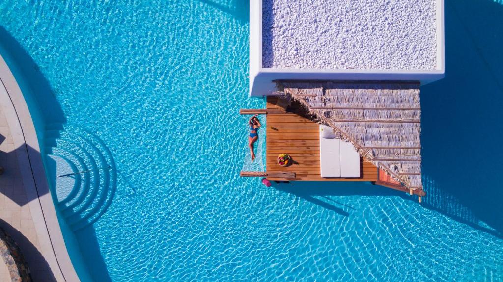 Discover A Heaven of Tranquility: Enjoy 5 Nights at Stella Island Luxury Resort & Spa with Half Board