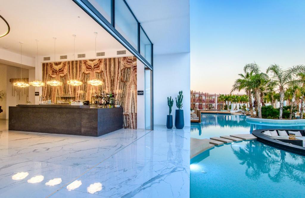 Discover A Heaven of Tranquility: Enjoy 5 Nights at Stella Island Luxury Resort & Spa with Half Board