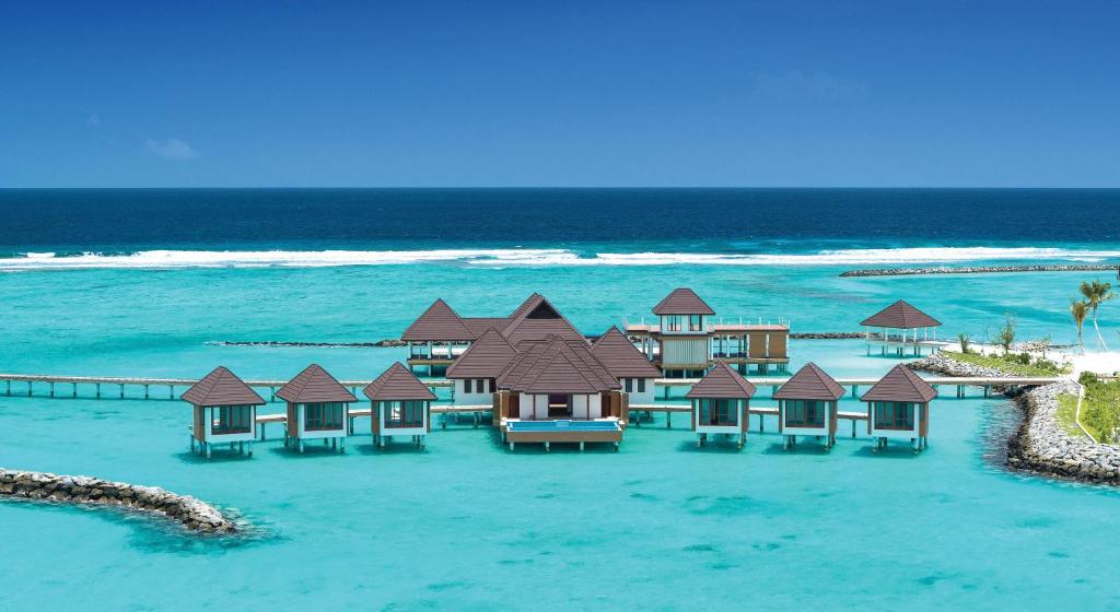 Ignite romance with a 10 Nights Stay at Varu by Atmosphere Water Villa with Pool Maldives and Fairmont Palm Dubai