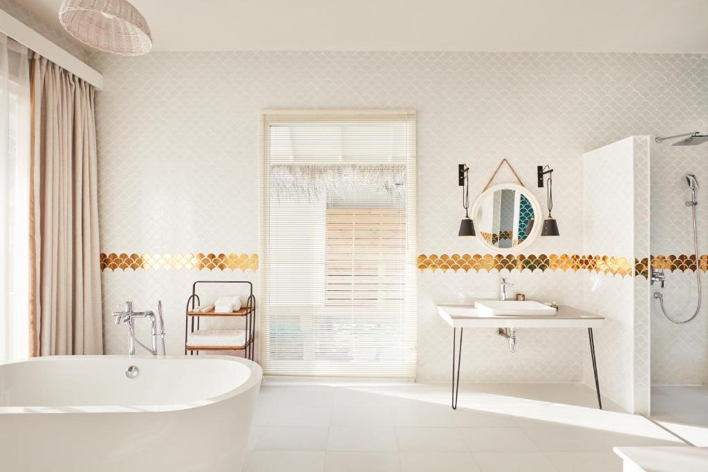 “Maldives Bliss: 9 Nights at Sun Siyam Iruveli with Premium All-Inclusive”