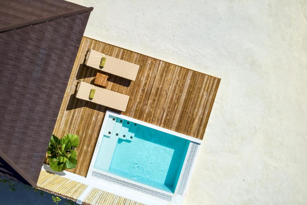 Family, Deal Extravaganza: 07 Nights Stay at Grand Water Villa Maldives for (2 Adults + 2 Kids up to 14.99 years),w/flights and transfers