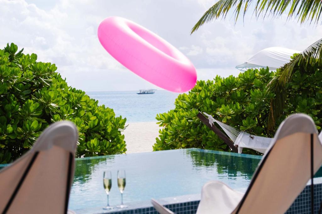 Unleash Your Wanderlust: Enjoy 09 Nights in a Maldives overwater villa with pool,