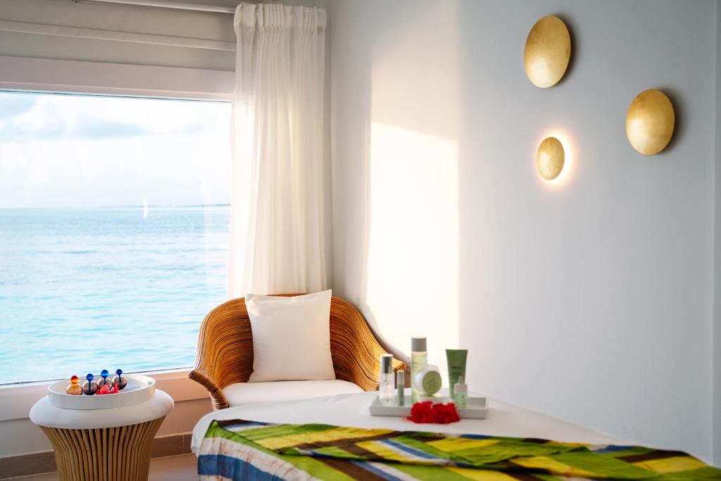 Unleash Your Wanderlust: Enjoy 09 Nights in a Maldives overwater villa with pool,