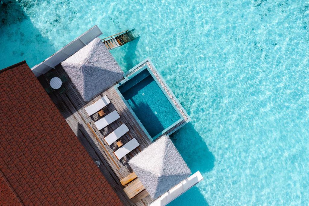 Unleash Your Wanderlust: Enjoy 09 Nights in a Maldives overwater villa with pool,