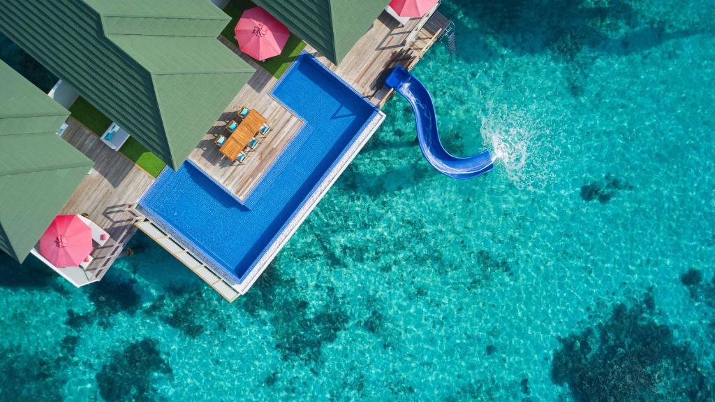 10 Nights of Unmatched Luxury Dubai Elegance Meets Maldivian Paradise Free Upgrade to Lagoon Villa + Pool & SLide with 24 Hour Premium All-Inclusive Benefits Only in £2999/PP