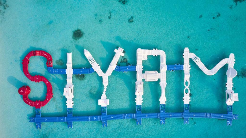 10 Nights of Unmatched Luxury Dubai Elegance Meets Maldivian Paradise Free Upgrade to Lagoon Villa + Pool & SLide with 24 Hour Premium All-Inclusive Benefits Only in £2999/PP