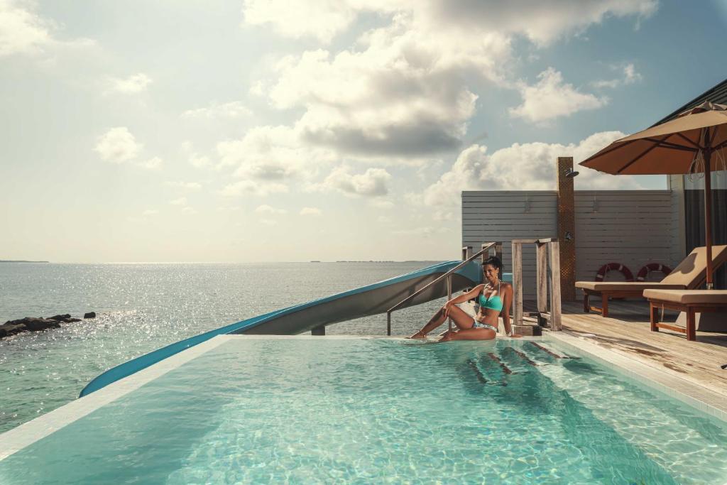 10 Nights of Unmatched Luxury Dubai Elegance Meets Maldivian Paradise Free Upgrade to Lagoon Villa + Pool & SLide with 24 Hour Premium All-Inclusive Benefits Only in £2999/PP