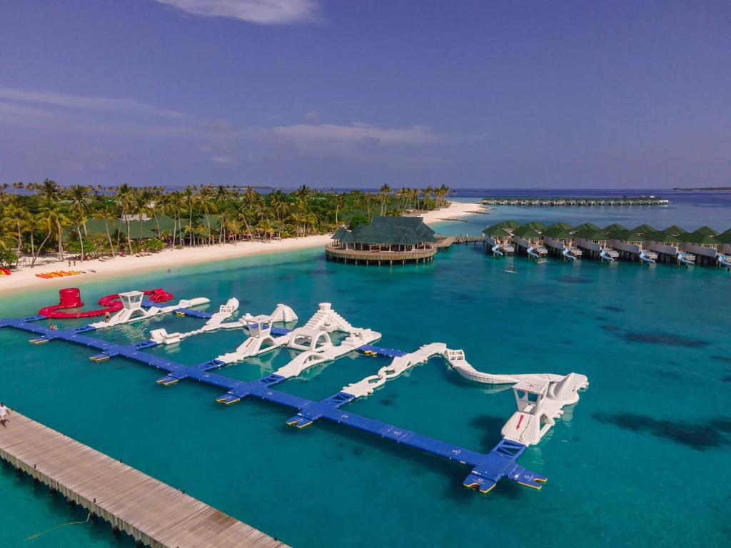10 Nights of Unmatched Luxury Dubai Elegance Meets Maldivian Paradise Free Upgrade to Lagoon Villa + Pool & SLide with 24 Hour Premium All-Inclusive Benefits Only in £2999/PP