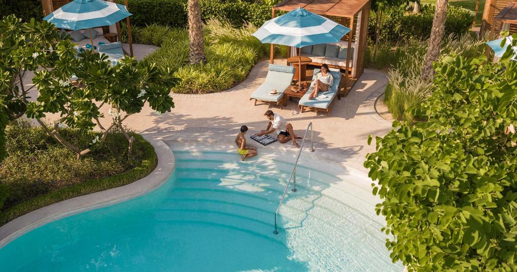 10 Nights of Unmatched Luxury Dubai Elegance Meets Maldivian Paradise Free Upgrade to Lagoon Villa + Pool & SLide with 24 Hour Premium All-Inclusive Benefits Only in £2999/PP