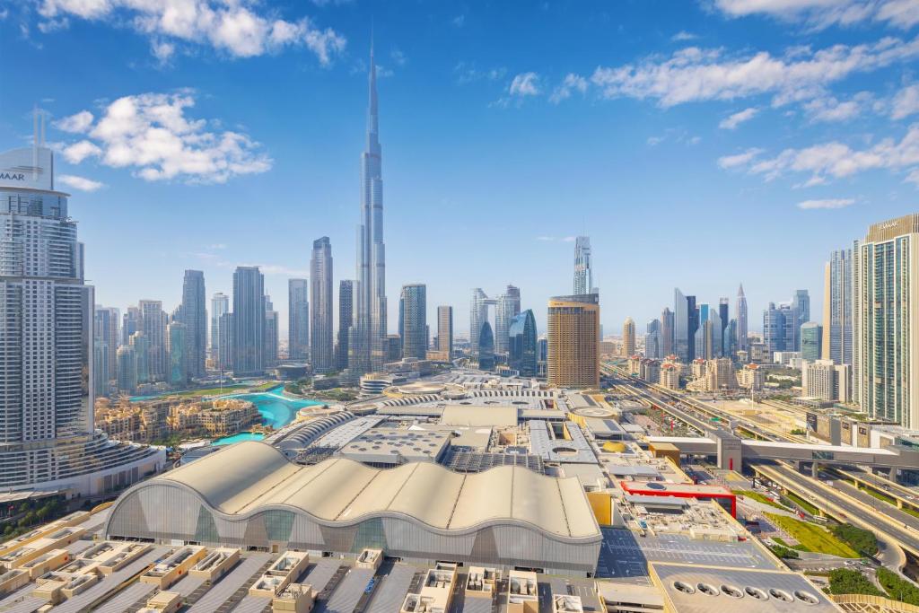 Let the Sunset Serenade you into Blissful 03 Nights at The Address Fountain Views