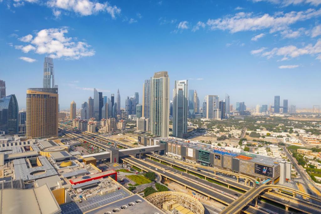 Let the Sunset Serenade you into Blissful 03 Nights at The Address Fountain Views