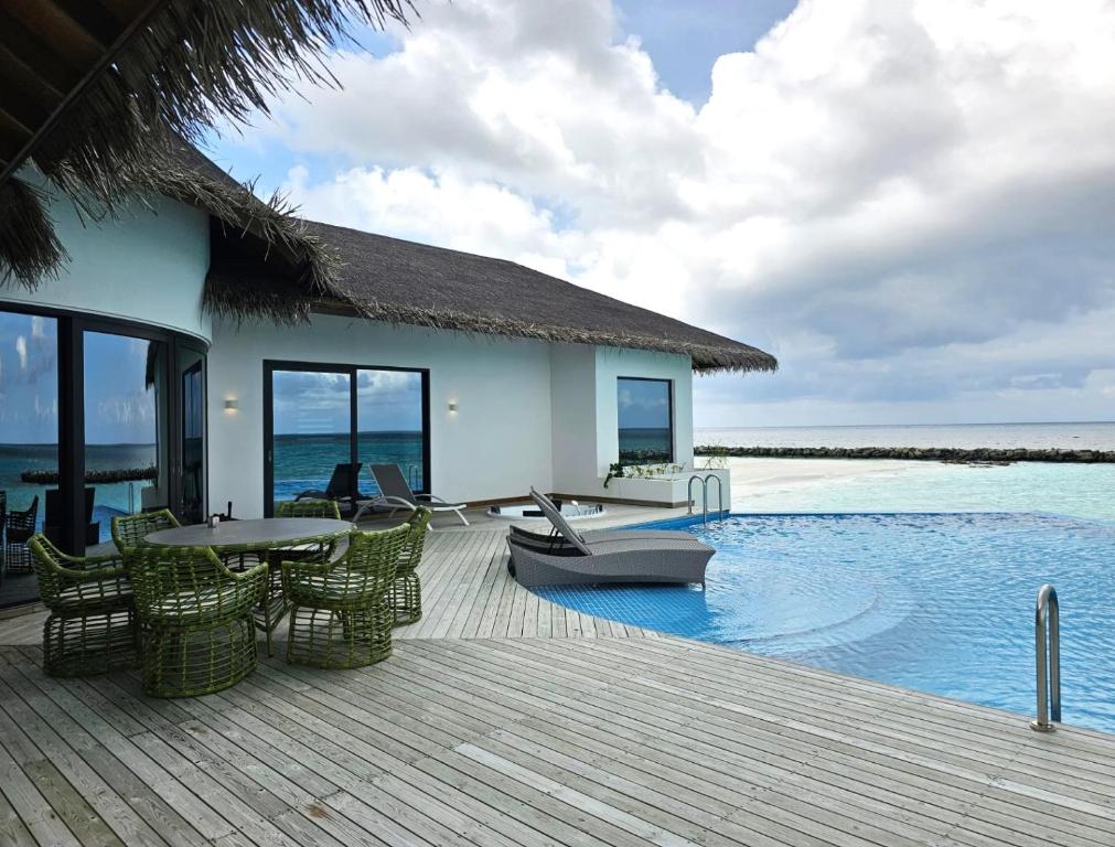 “07 Nights in a Beach Villa at NOOE Maldives Kunaavashi, Maldives”with flights & tranfers