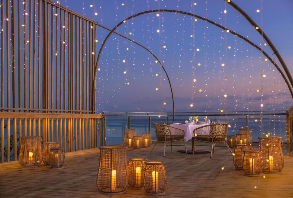 MALDIVES SUNSET OVERWATER POOL VILLA — FOR THE WHOLE FAMILY! 7 NIGHTS • 2 ADULTS + 2 KIDS • ALL-INCLUSIVE MAY 2027 FROM £6,999 PER FAMILY