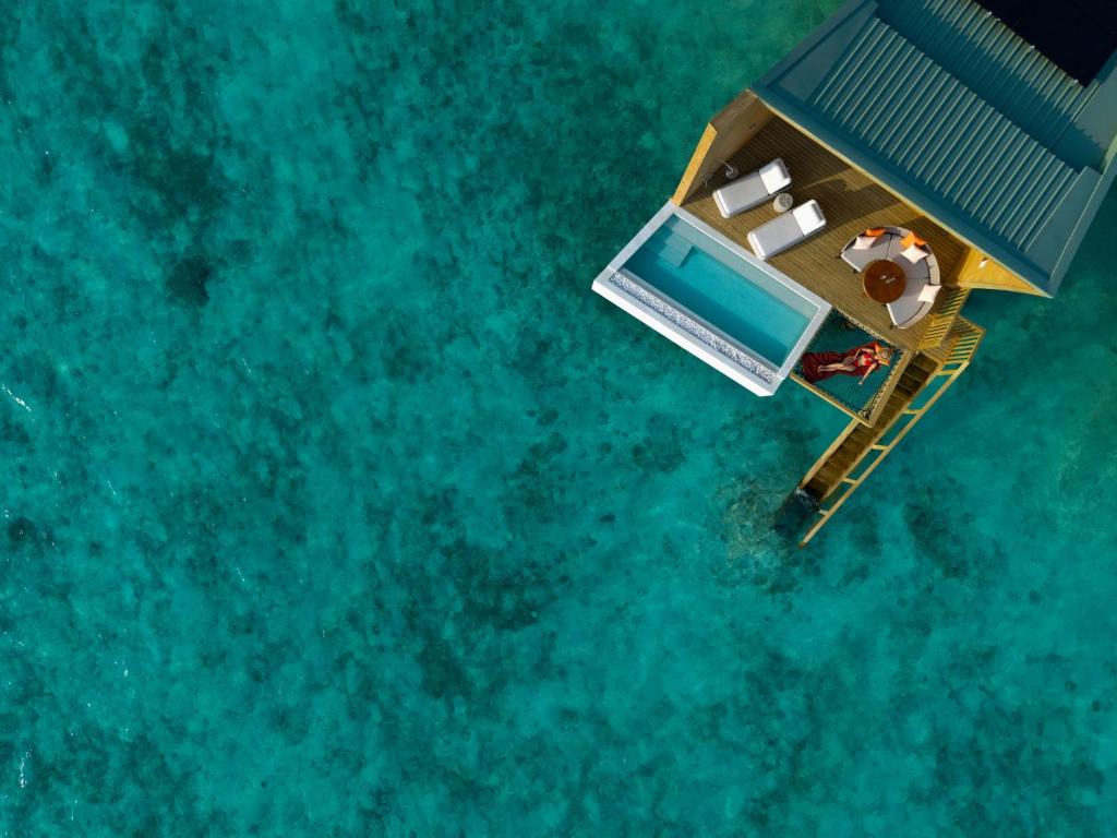 MALDIVES SUNSET OVERWATER POOL VILLA — FOR THE WHOLE FAMILY! 7 NIGHTS • 2 ADULTS + 2 KIDS • ALL-INCLUSIVE MAY 2027 FROM £6,999 PER FAMILY