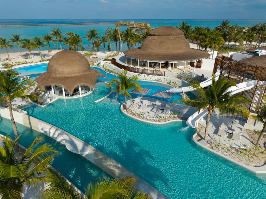 MALDIVES SUNSET OVERWATER POOL VILLA — FOR THE WHOLE FAMILY! 7 NIGHTS • 2 ADULTS + 2 KIDS • ALL-INCLUSIVE MAY 2027 FROM £6,999 PER FAMILY