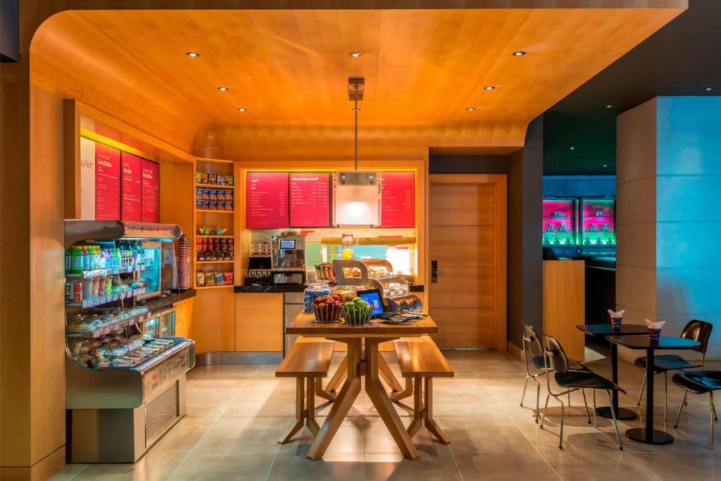 Twin Center Gwtaway: 10 Nights in Grand Water Villa Sun Siyam Olhuveli, Maldives & Abu Dhabi, w/flights & transfers at £2,899 pp