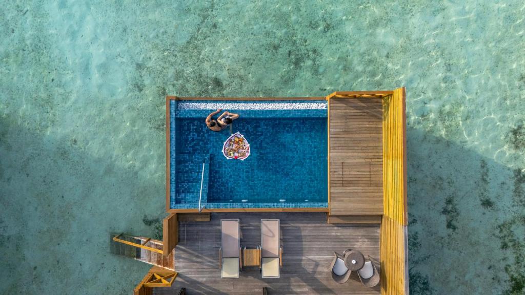 Exclusive 07 Nights You & Me Cocoon Maldives at Aqua Suite with Slide w/flight Transfers,