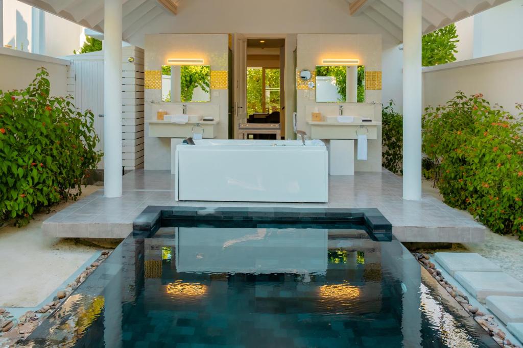 10 Nights of Unmatched Luxury Dubai Elegance Meets Maldivian Paradise Free Upgrade to Lagoon Villa + Pool & SLide with 24 Hour Premium All-Inclusive Benefits Only in £2999/PP