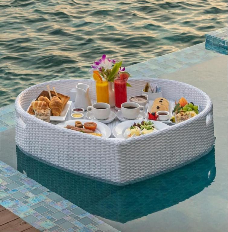 “07 Night Escape to Paradise Bandos Maldives with Standard Beachfront Room”