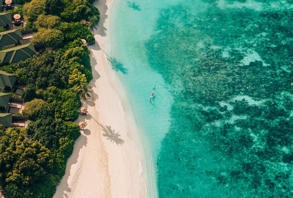 10 Nights of Unmatched Luxury Dubai Elegance Meets Maldivian Paradise Free Upgrade to Lagoon Villa + Pool & SLide with 24 Hour Premium All-Inclusive Benefits Only in £2999/PP