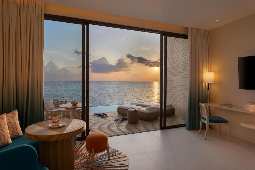 MALDIVES SUNSET OVERWATER POOL VILLA — FOR THE WHOLE FAMILY! 7 NIGHTS • 2 ADULTS + 2 KIDS • ALL-INCLUSIVE MAY 2027 FROM £6,999 PER FAMILY