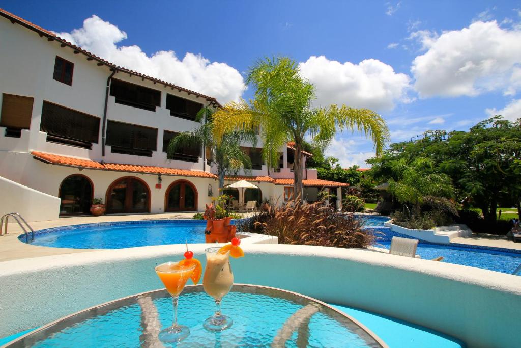 Escape to Paradise: 07 Nights All-Inclusive Stay at Sugar Cane Club Hotel And Spa