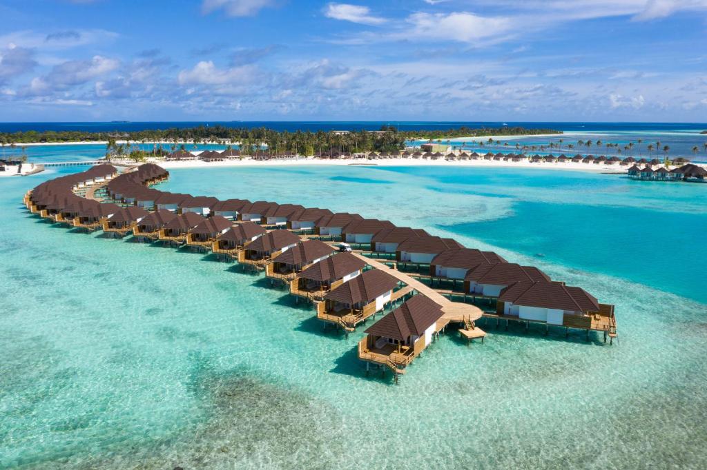 7-Night Maldives Escape at Sun Siyam Olhuveli – Beach Pavilion Stay with 24-Hour All-Inclusive Dining from £2,099 PP!